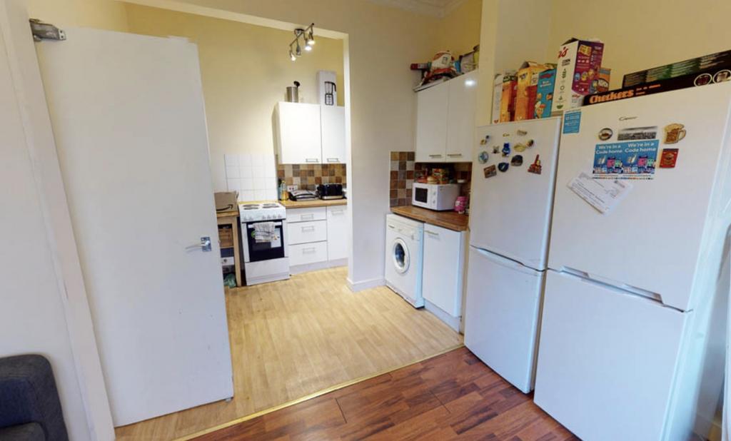 A cozy, well-maintained kitchen area with good ...