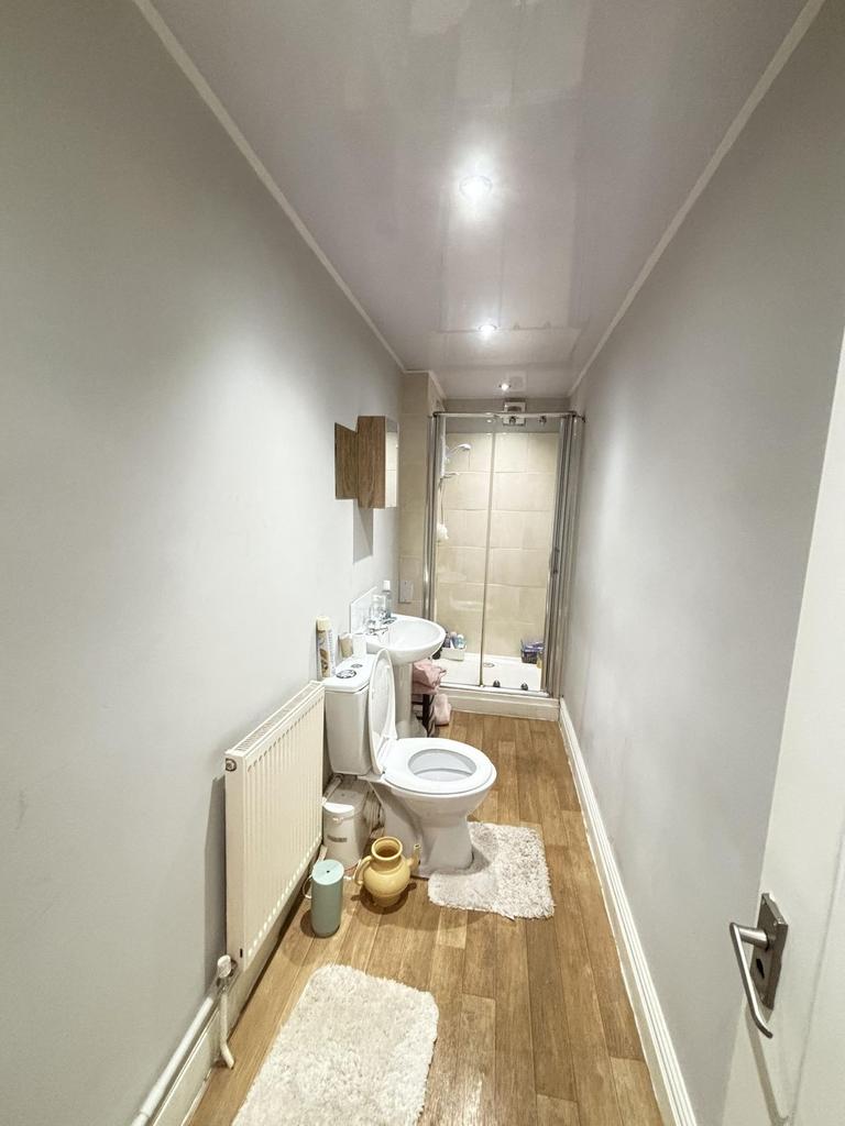 A clean and well-maintained bathroom featuring ...