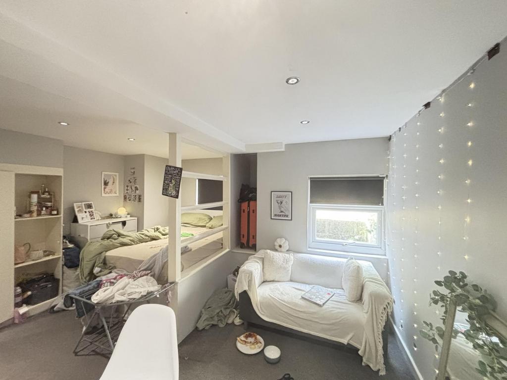 Bright and welcoming living area featuring a co...