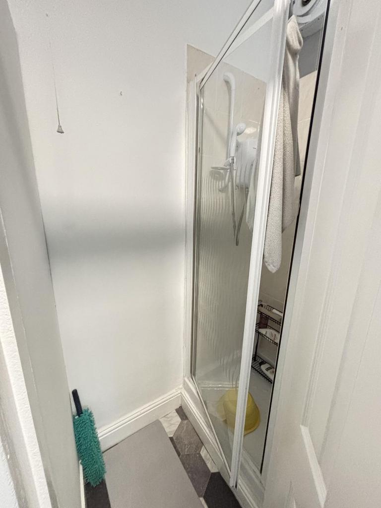 A clean and well-maintained bathroom featuring ...