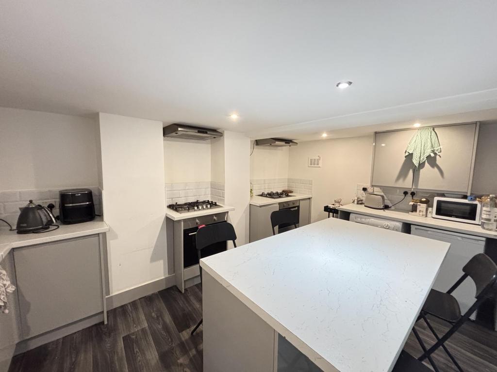Modern and clean kitchen with ample workspace a...