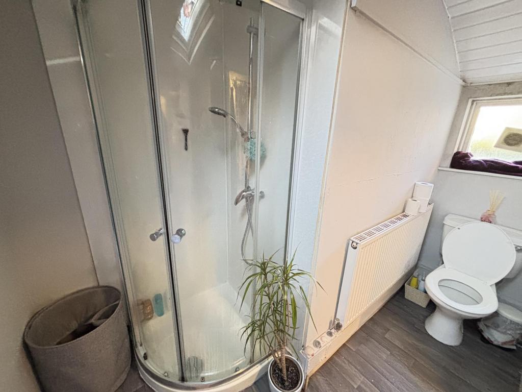 A clean and well-maintained bathroom featuring ...