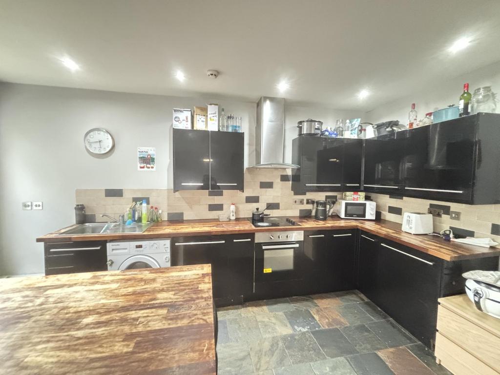 A modern, well-maintained kitchen with ample co...