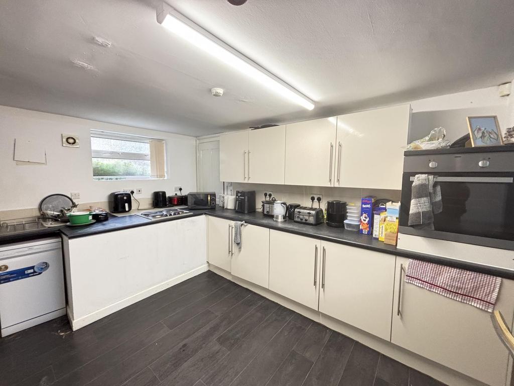 Modern and well-maintained kitchen featuring sl...