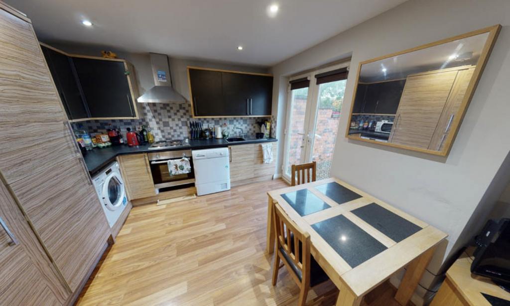 A well-maintained kitchen area featuring modern...