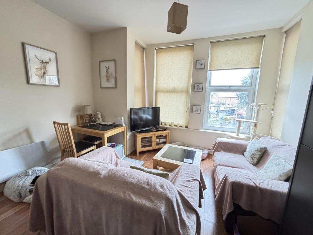Bright and welcoming living room filled with na...