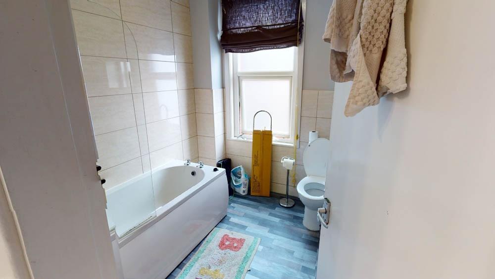 A clean and well-maintained bathroom featuring ...