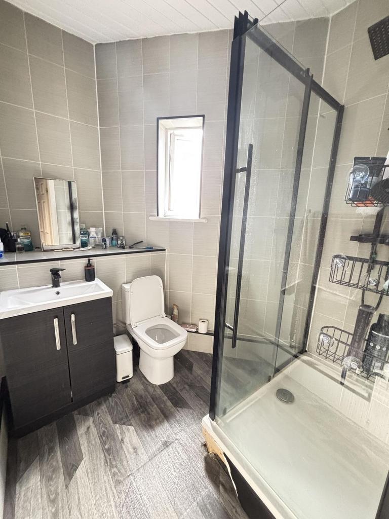 A modern, well-maintained bathroom featuring a ...