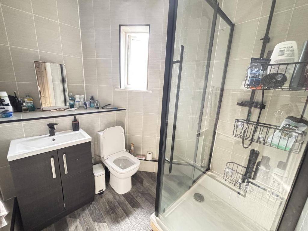 A modern, well-maintained bathroom featuring a ...