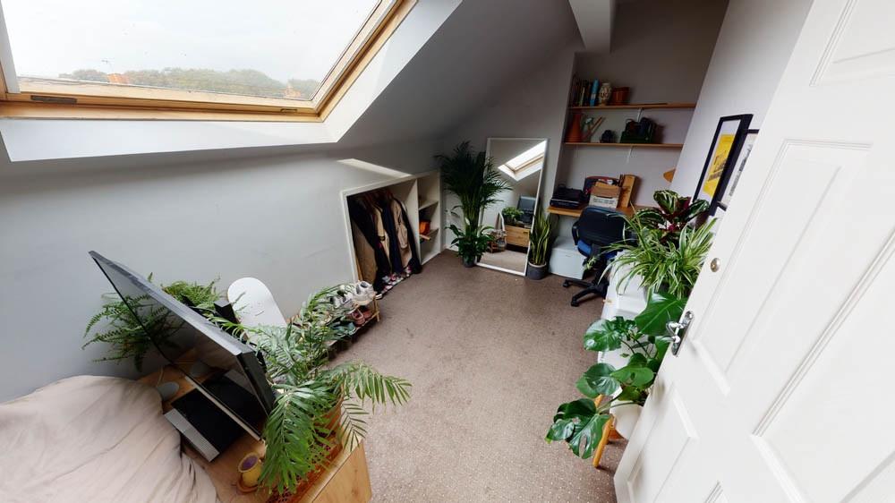 A bright and welcoming living room filled with ...