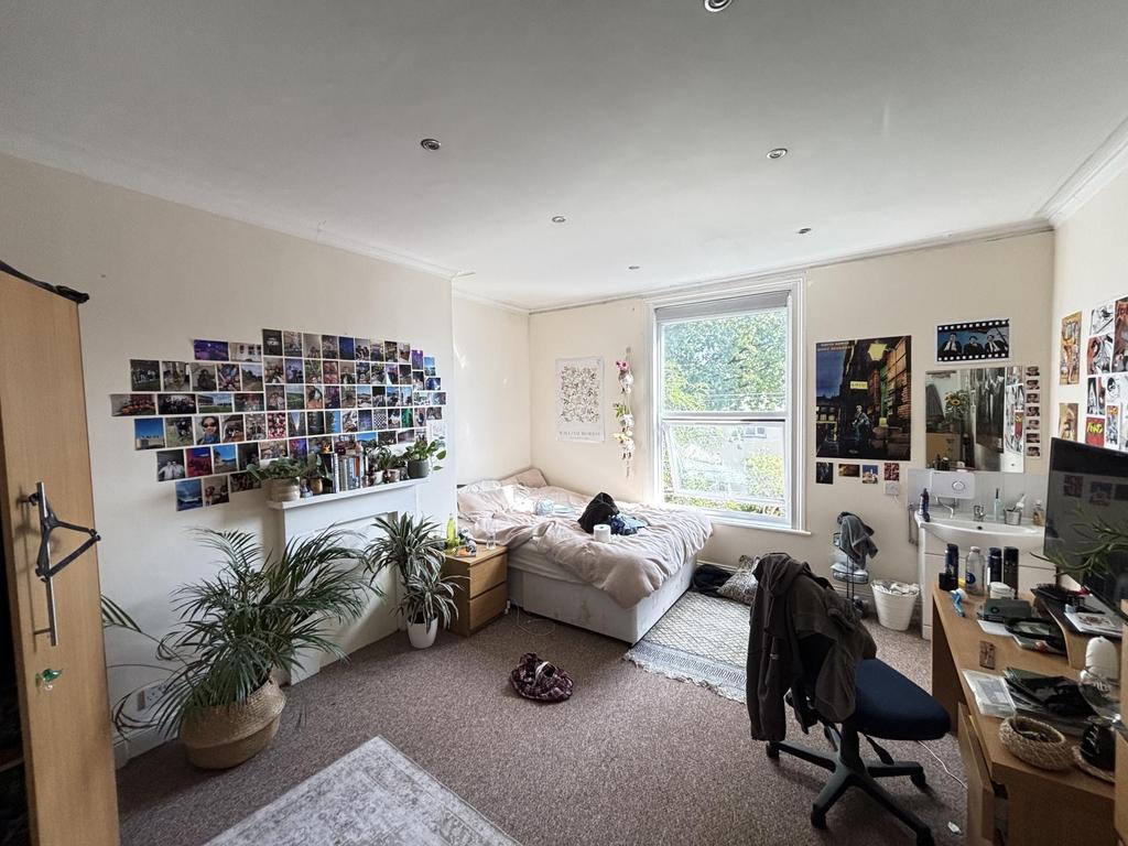 A bright and welcoming living room filled with ...
