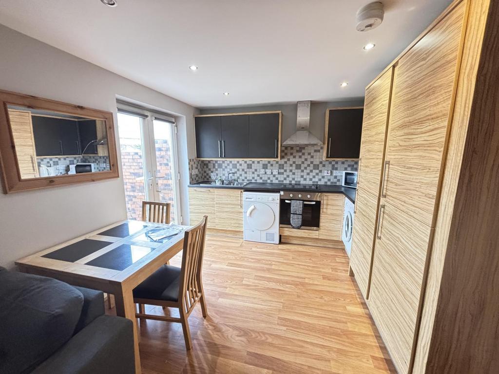 A bright and welcoming living space with ample ...