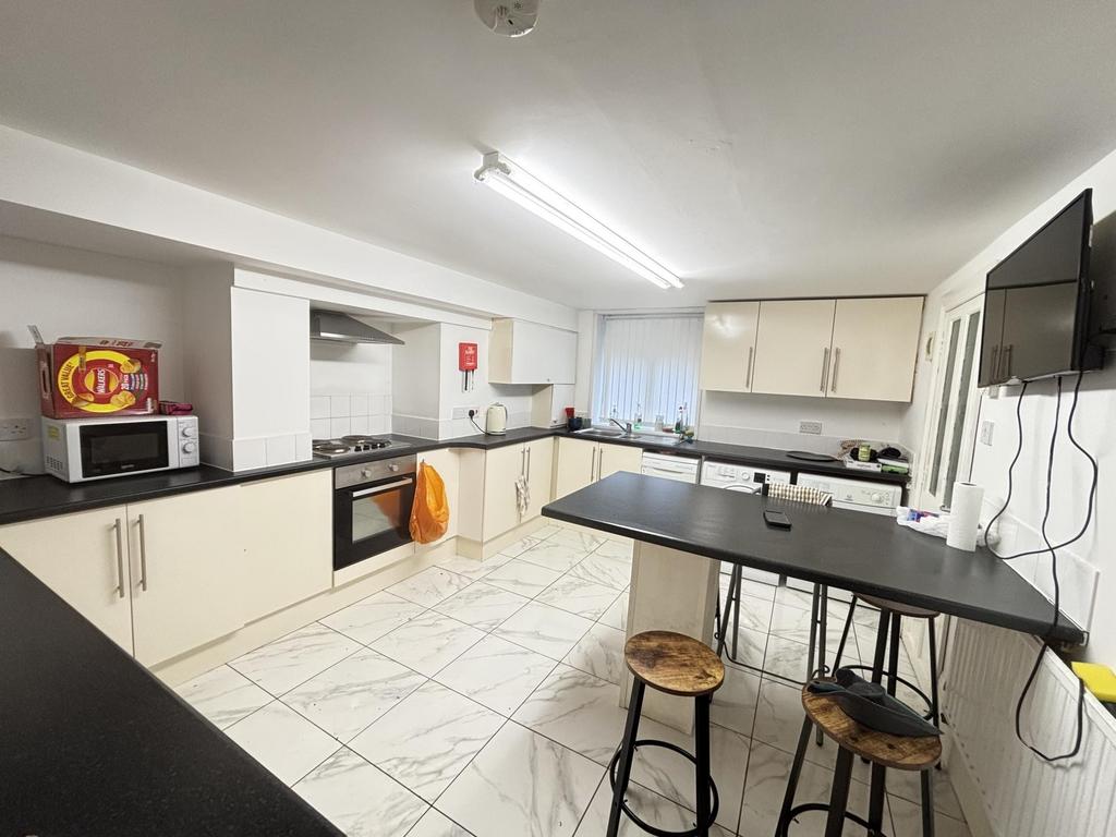 Modern and bright kitchen with ample counter sp...