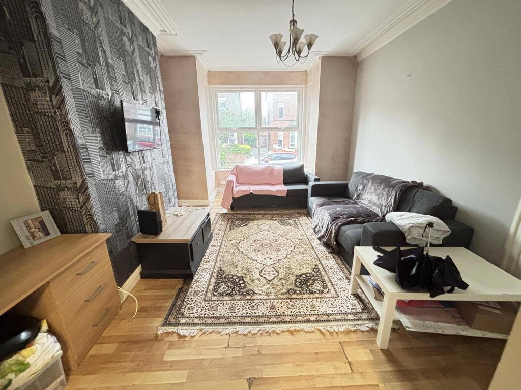Bright and welcoming living room featuring a co...