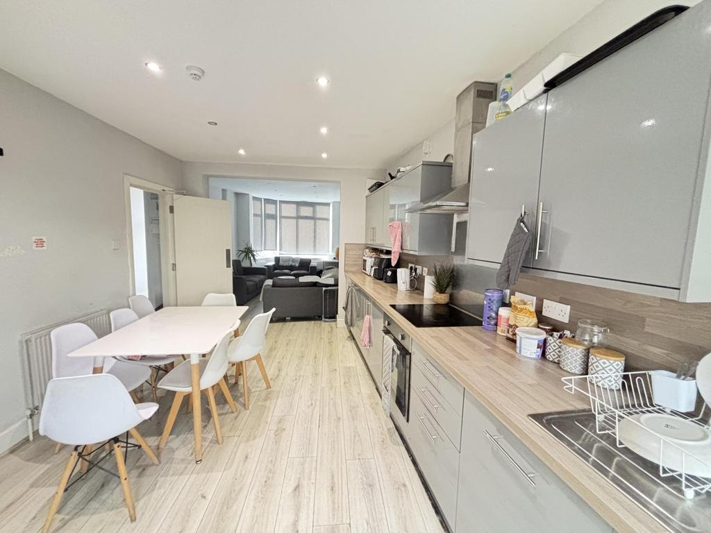 Bright and modern kitchen with ample natural li...