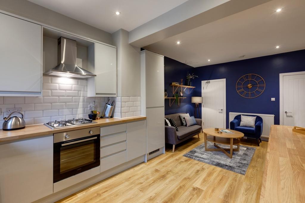 A modern and inviting living room featuring a c...