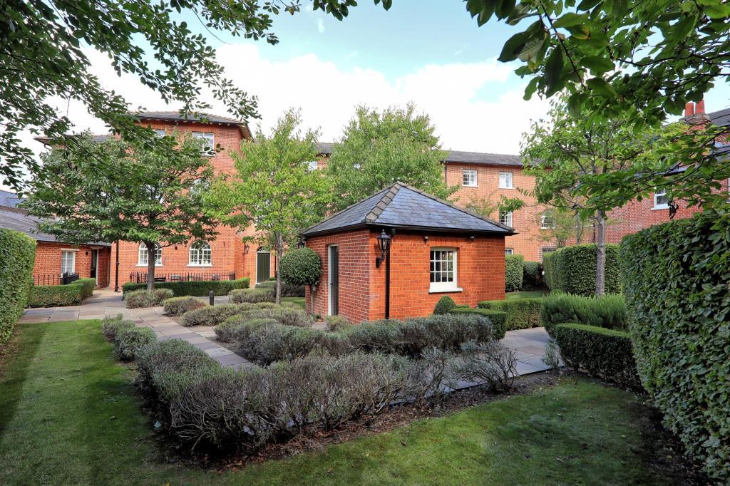 Shot showing front of building and communal area