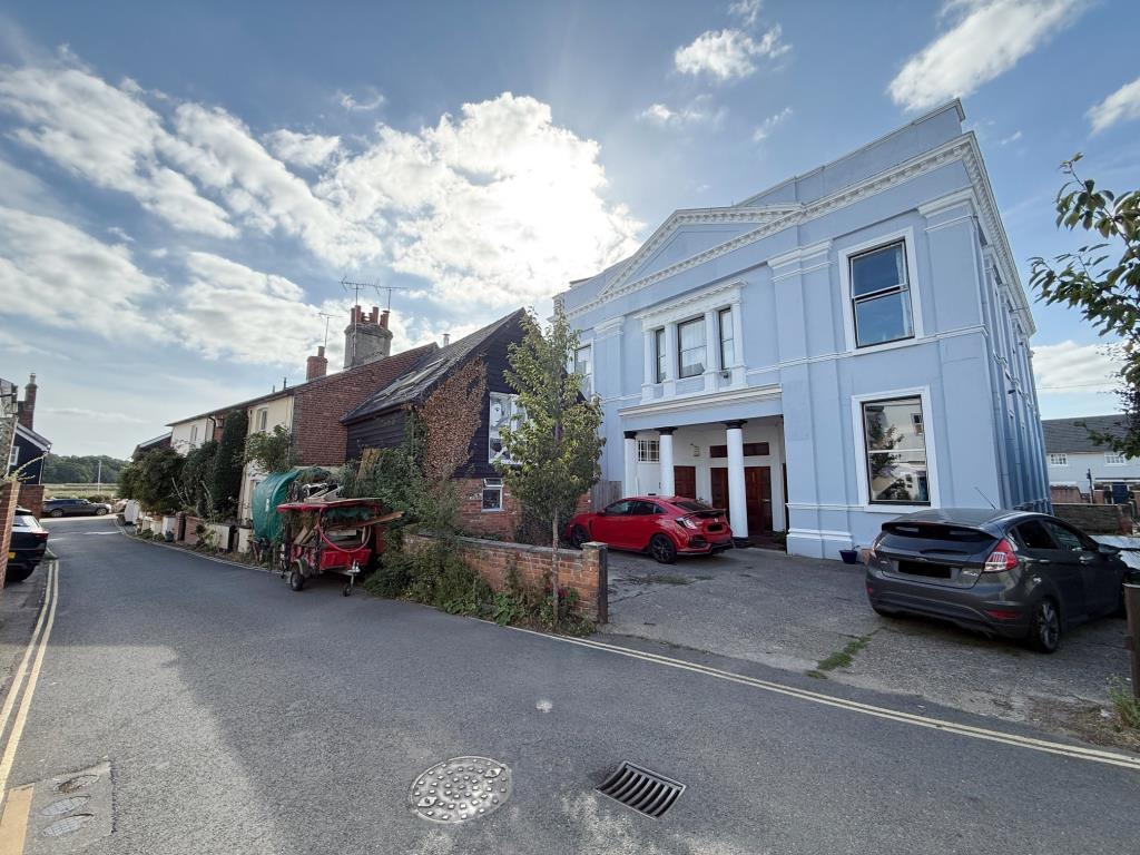 View of the building the road leading to the Quays