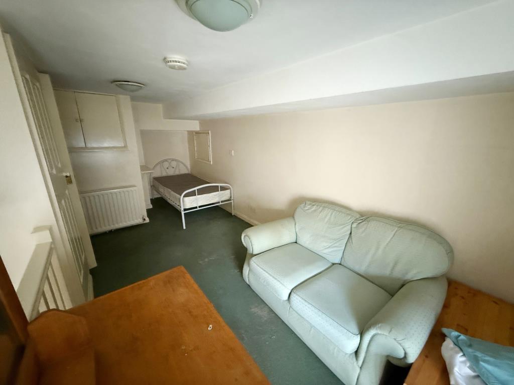 Living and sleeping area in Bedsit 1