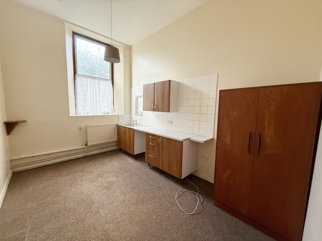 Further bedside room with window to side