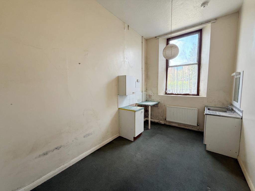 Additional bedside room with window and high ceili