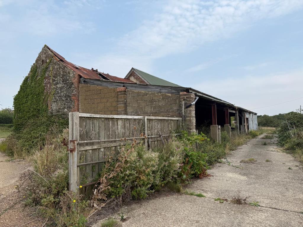 View of barn with concrete hardstanding area