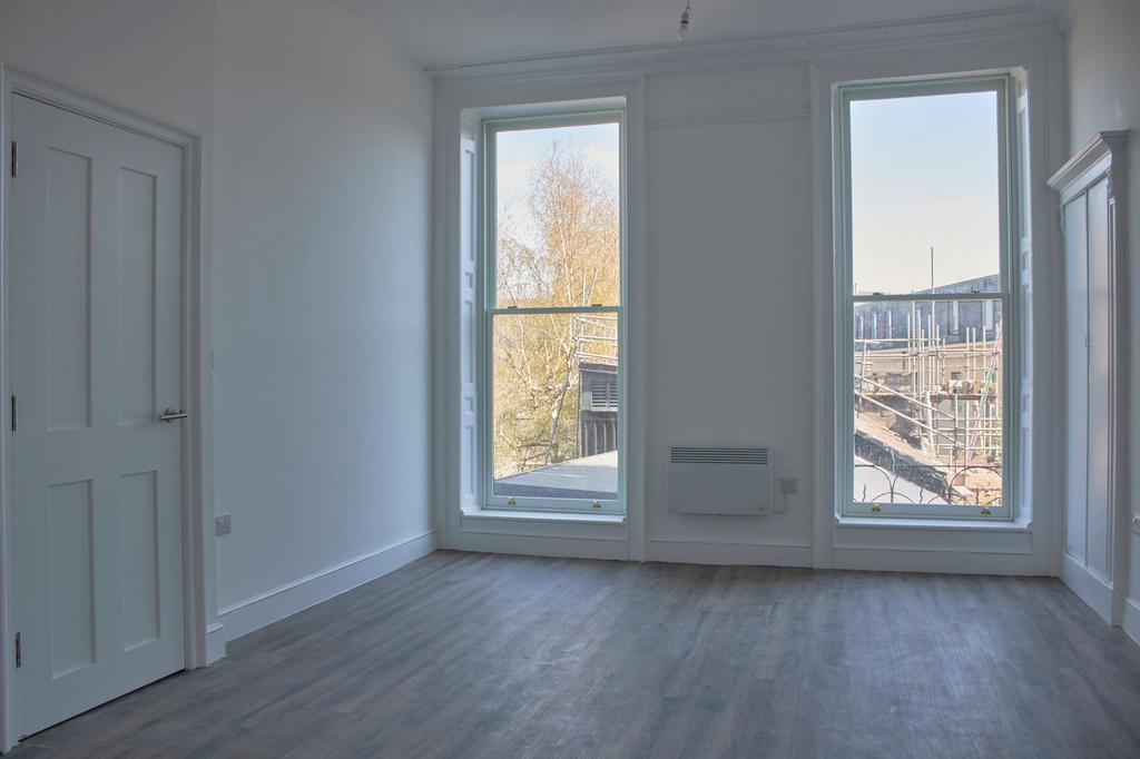 Bright and airy master bedroom featuring large ...