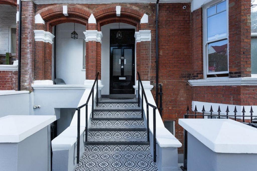 The entrance of a well-maintained property with...