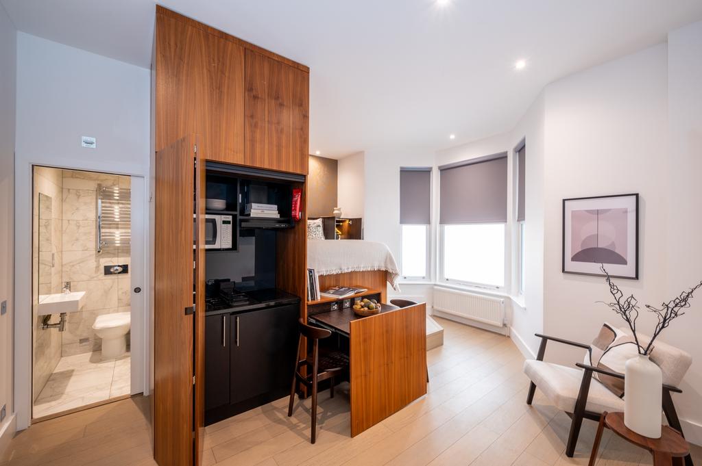 Bright and modern single bedroom with a compact...