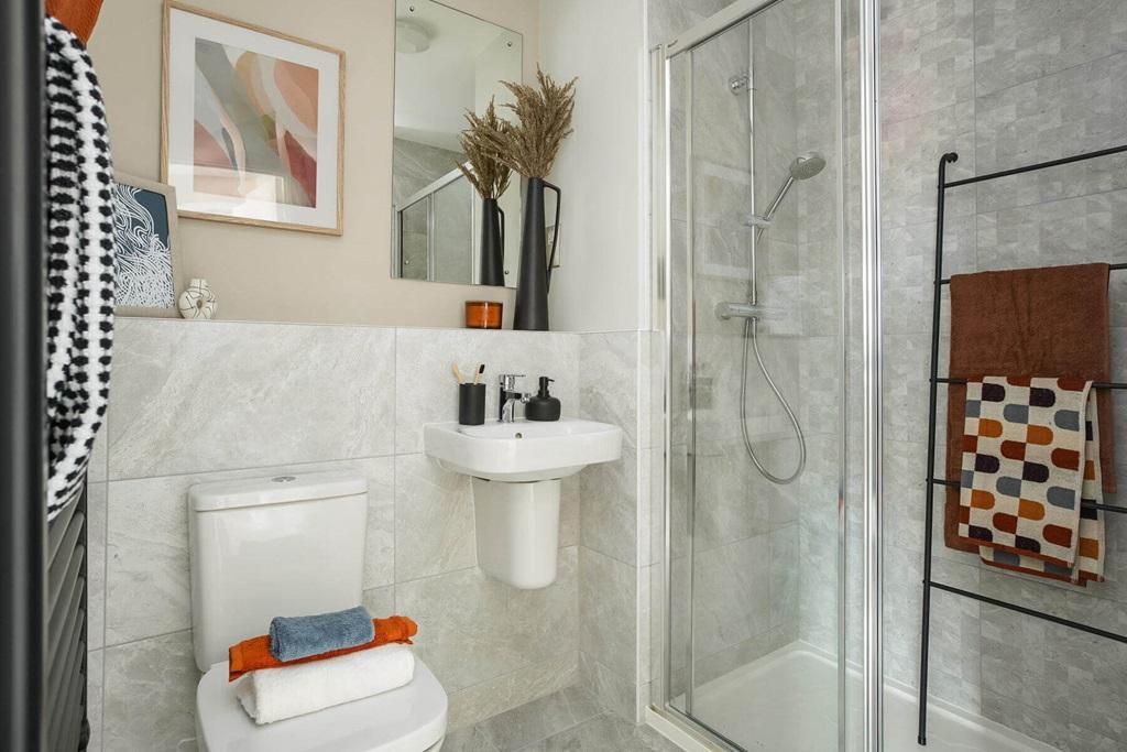 Bedroom 1 also hosts a private en suite shower...