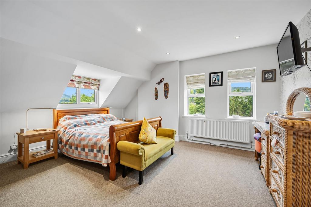 Bedroom One - bed and windows.jpg