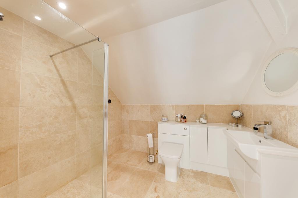 Large ensuite with partial wet room plumbing
