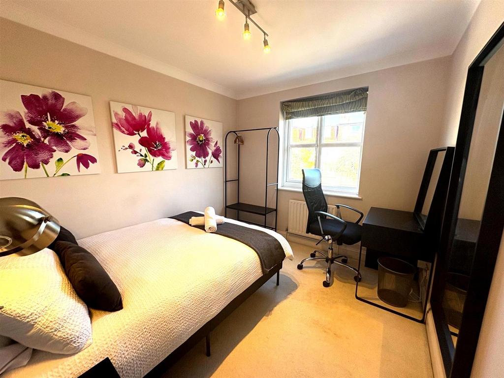 Brightened bedroom photo.jpg
