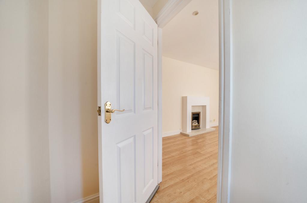 Entrance hallway through to living room