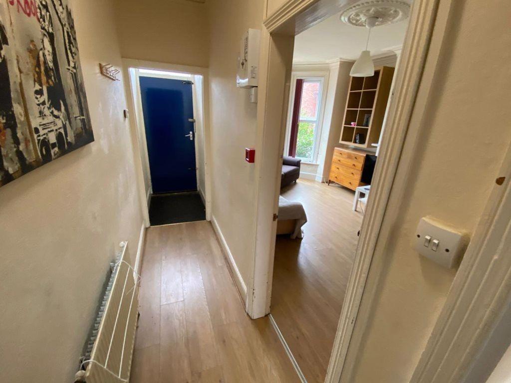 A clear exterior view showing the front entranc...