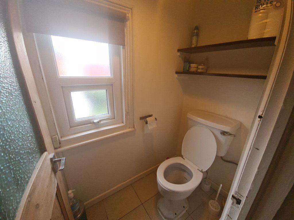 Clean and well-maintained bathroom with a large...