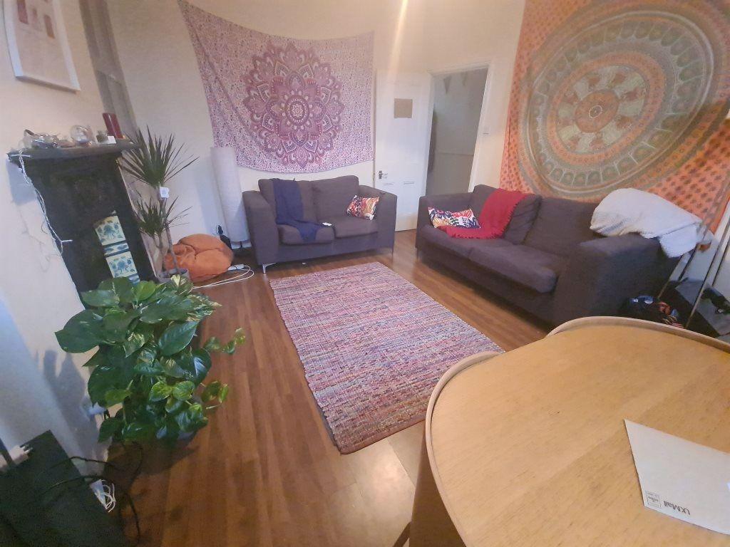 A cozy and inviting living room featuring conte...
