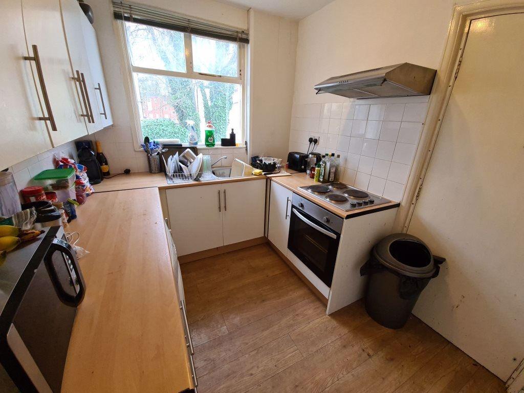 A functional kitchen area with ample counter sp...