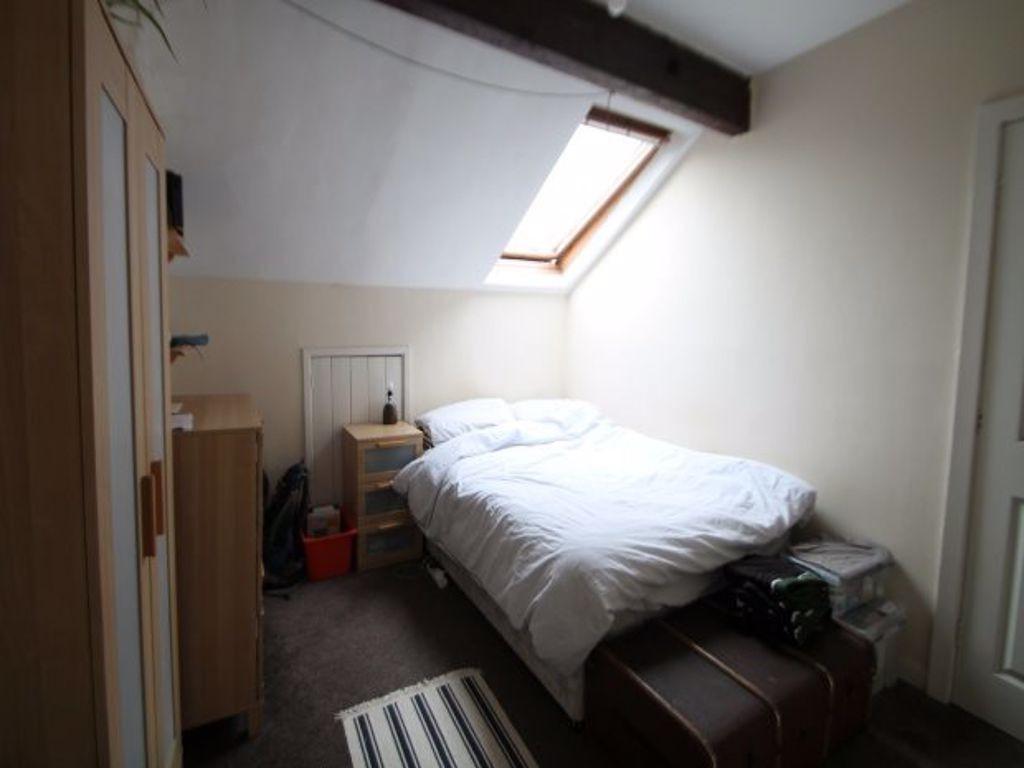 A bright and welcoming double bedroom with ampl...