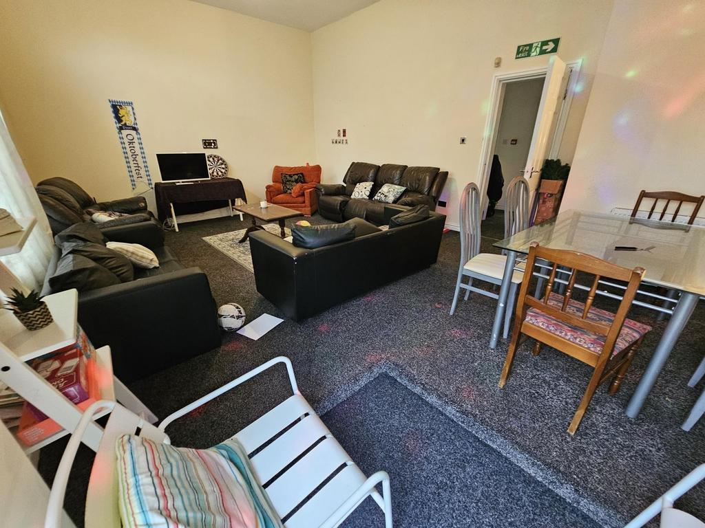 Bright and welcoming living room featuring mult...