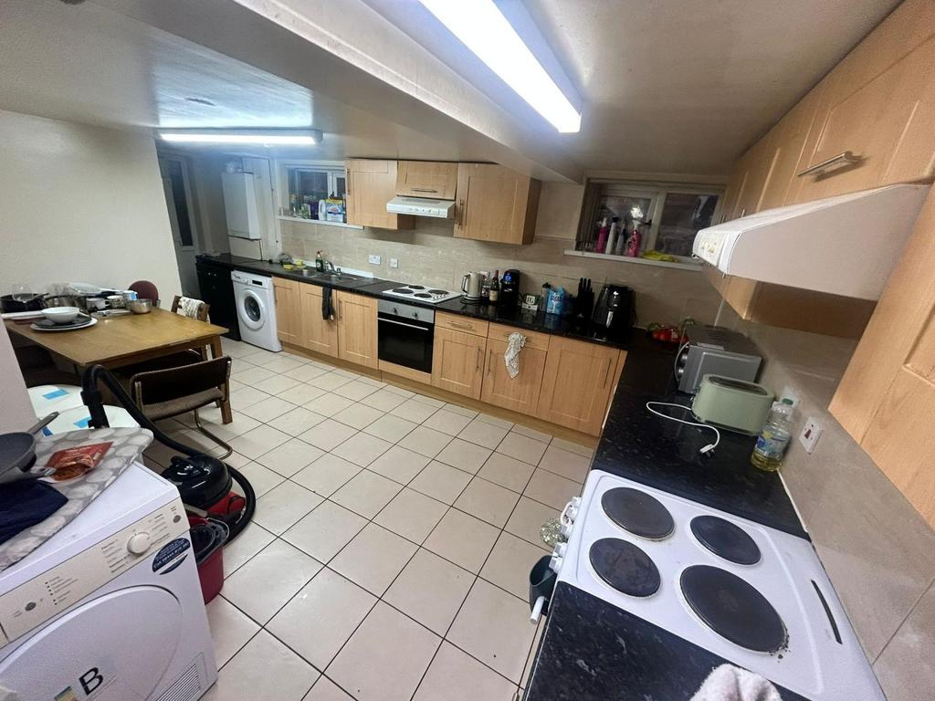 A modern and well-equipped kitchen featuring wo...