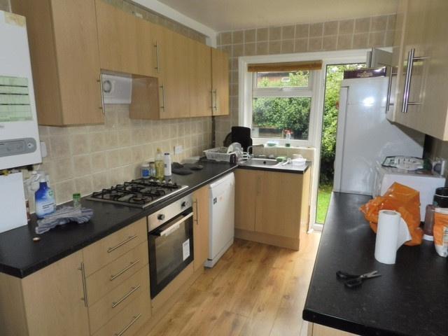 A bright and well-maintained kitchen featuring ...