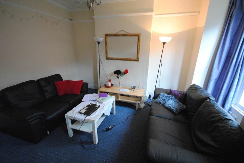 A spacious and inviting living room featuring c...