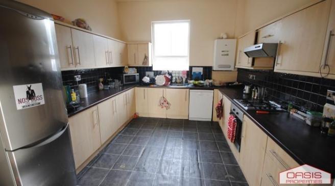 A modern and well-maintained kitchen with ample...