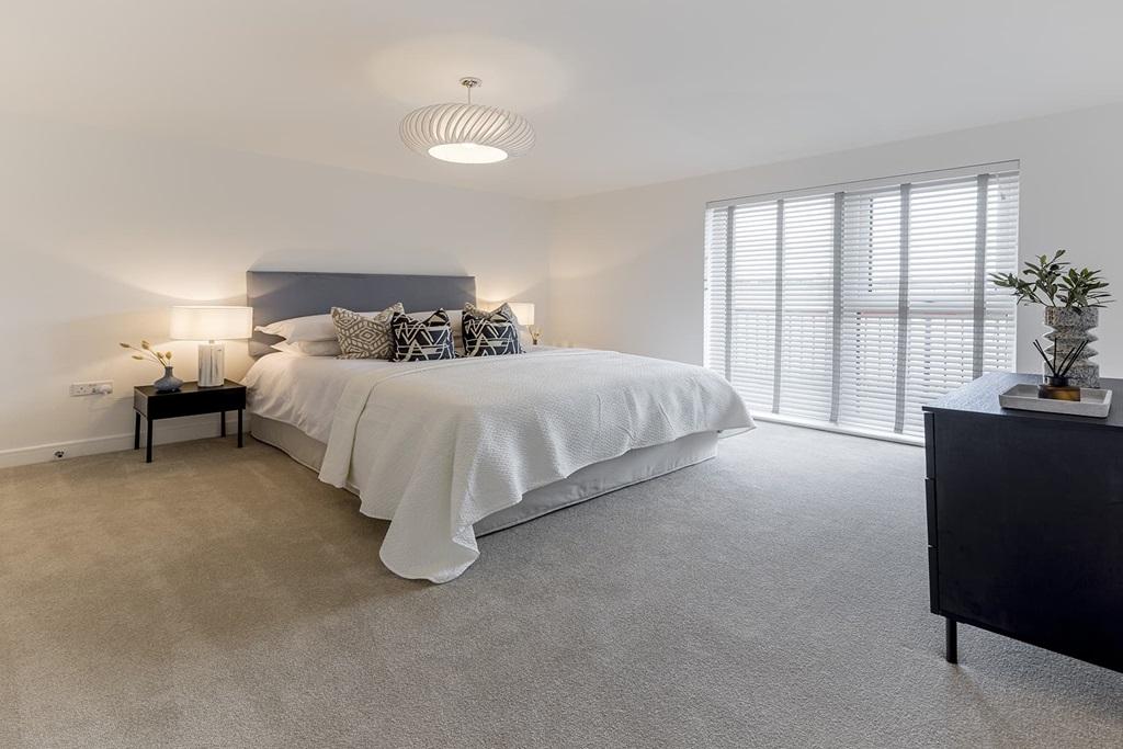 Wake up to natural light in your airy bedroom