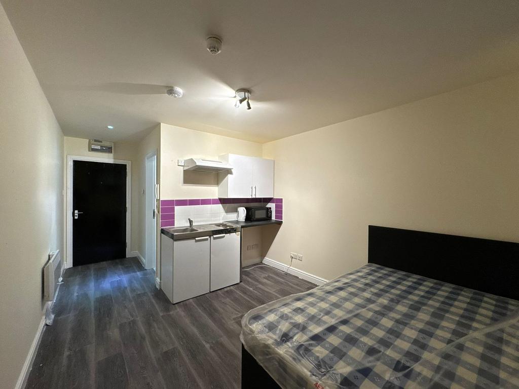 A spacious and well-maintained living area feat...