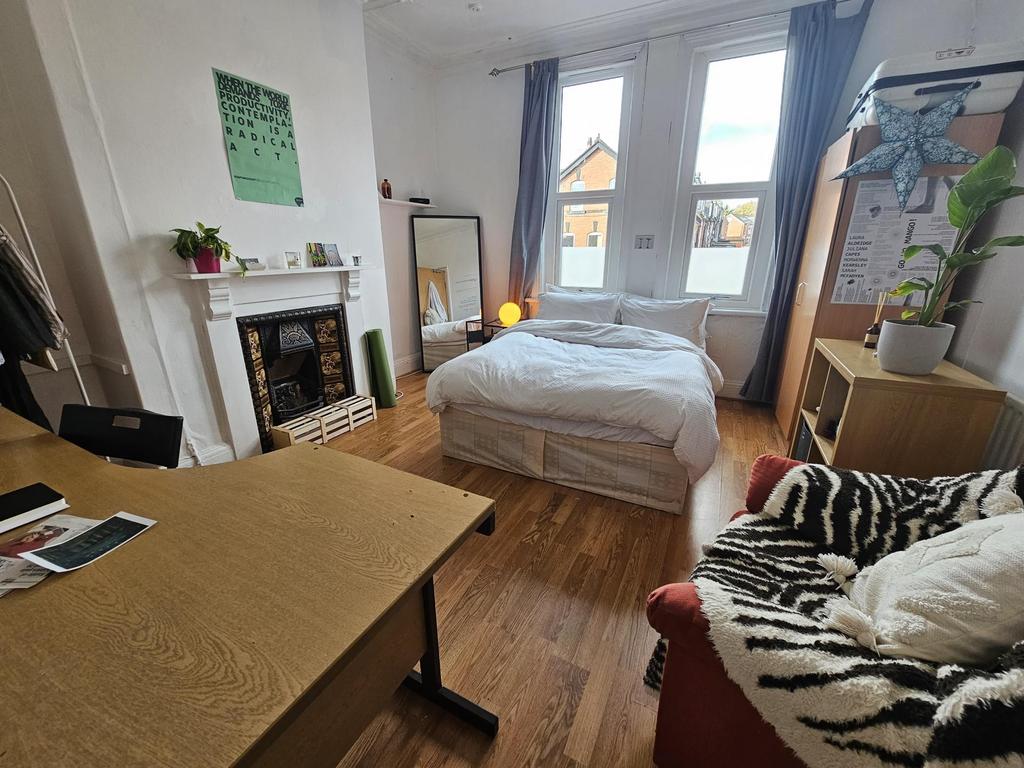 A bright and welcoming living room filled with ...