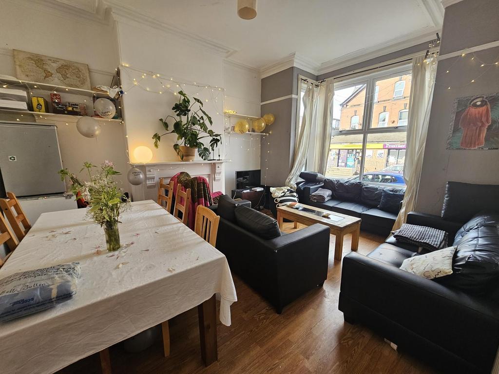 A bright and inviting living room with comforta...