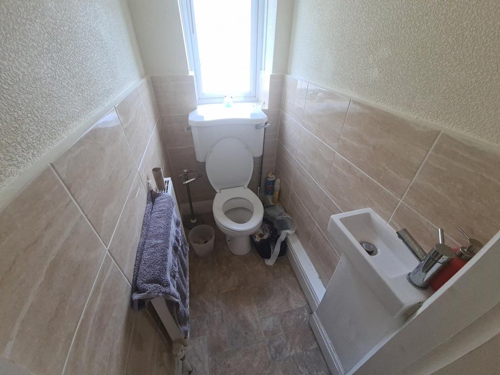 A spacious and well-maintained bathroom with a ...
