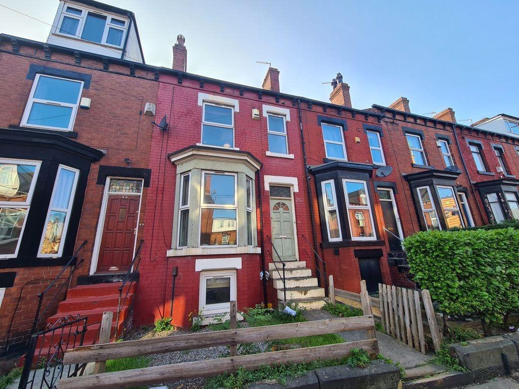 A charming front view of a row of traditional t...